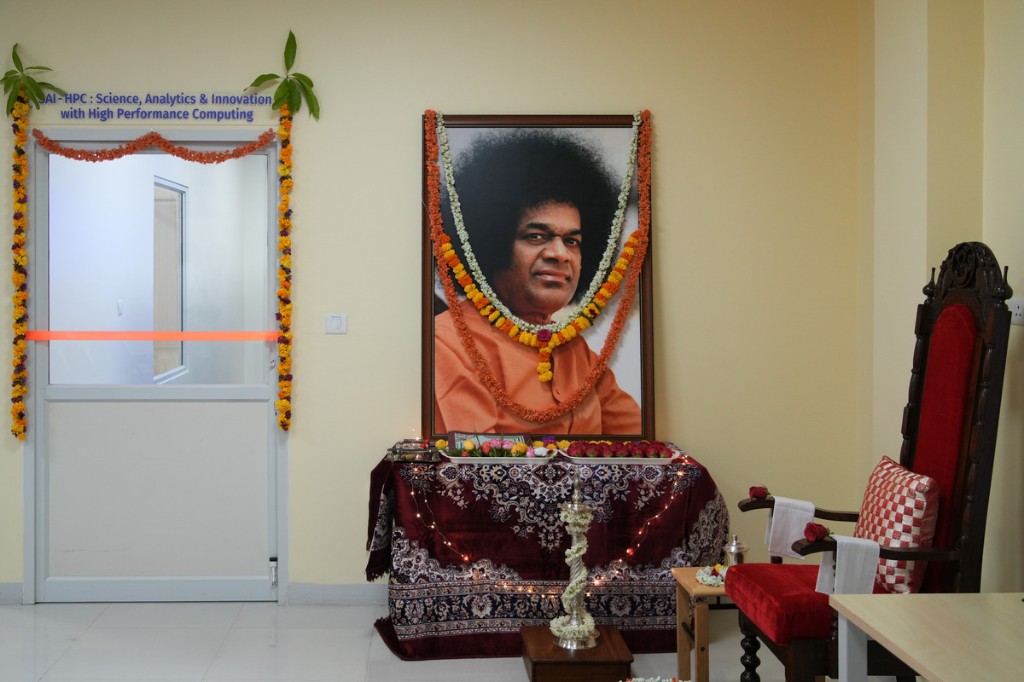 SAI-HPC inauguration ceremony at CRIF with ceremonial ribbon and Swami’s portrait